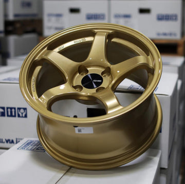 Rueda Enkei PF05 15x8 4x100 + 25 mm con compensación dorada