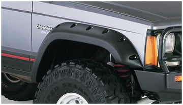 Bushwacker 84-01 Jeep Cherokee bengalas estilo recortado, 2 piezas, solo para utilitario deportivo de 4 puertas, color negro