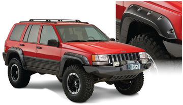 Bushwacker 93-98 Jeep Grand Cherokee bengalas estilo recortado 4 piezas - negro