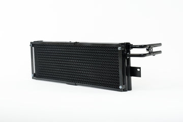 CSF BMW M3/M4 (G8X) Enfriador de aceite de transmisión con protector contra rocas