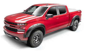 Bushwacker 14-15 Chevrolet Silverado 1500 (camas de 6 pies y 8 pies) estilo Forge bengalas 4 piezas - Negro