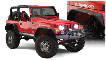 Bushwacker 97-06 Jeep Wrangler bengalas estilo plano 4 piezas - negro