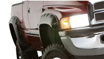 Bushwacker 20-22 Ram 1500 (excepto Rebel/TRX) 76.3/67.4 pulgadas bengalas estilo bolsillo para cama, 4 piezas - Diamd. Negro